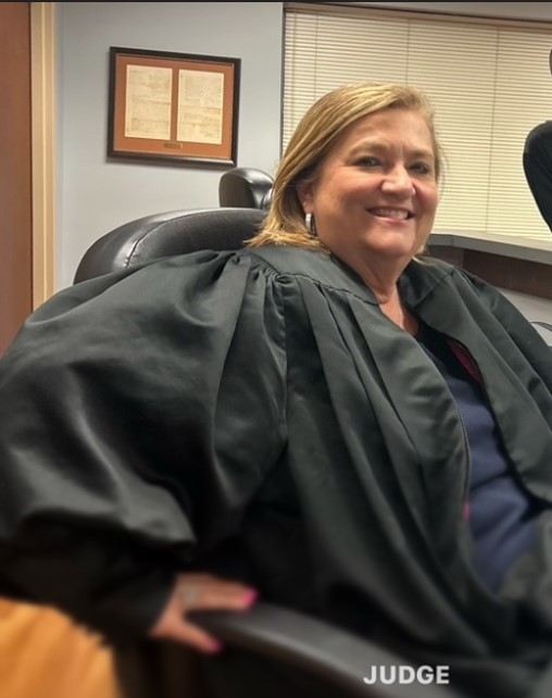 The Honorable Angela G. Martin