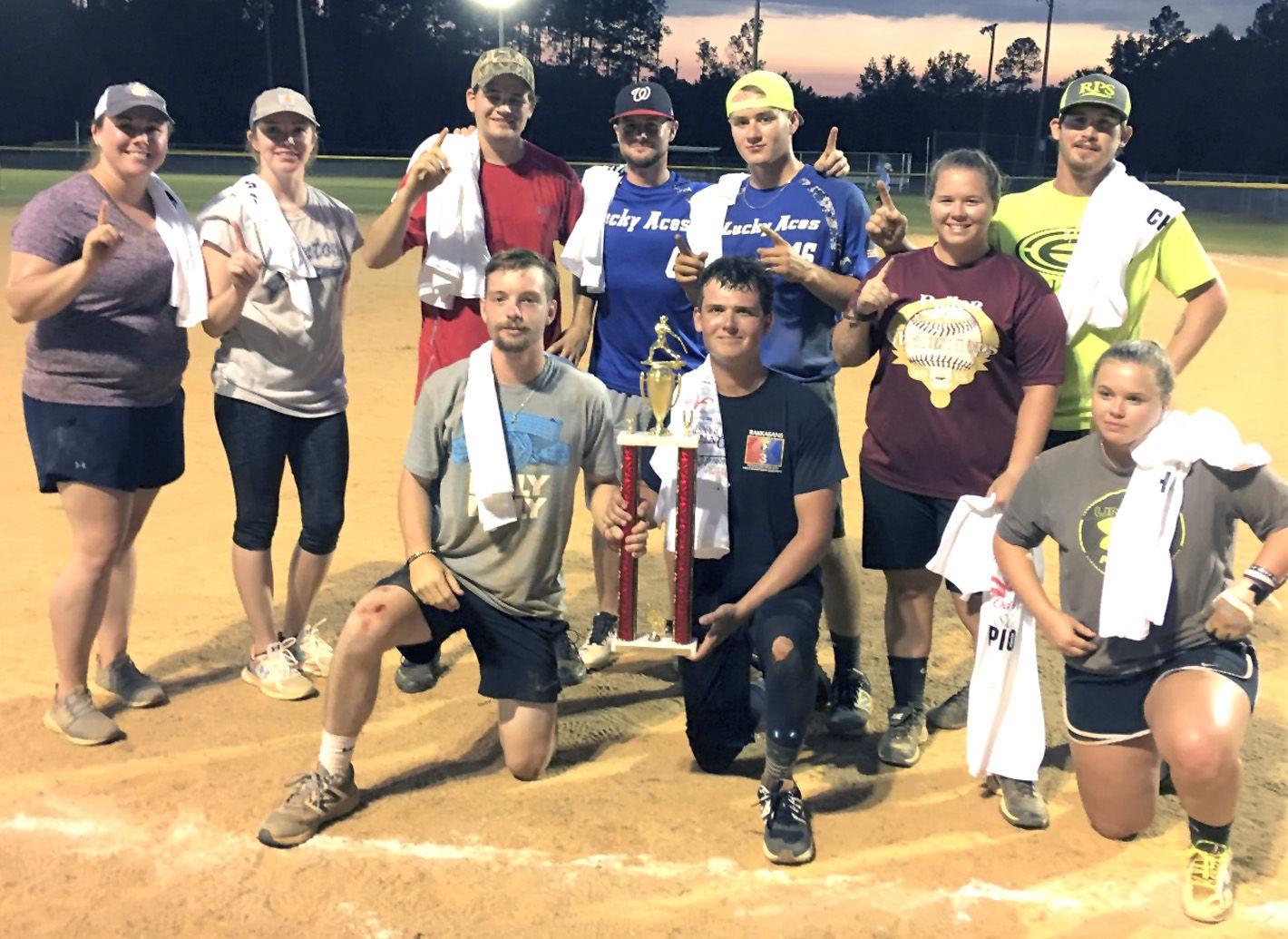 Members of The Who team won the first-place trophy and T-shirts in the first-ever Christmas at the North Pole Co-ed Softball Tournament Fundraiser at the town’s ball field on Oct. 6. The players are, standing from left, Brielle Busbee, Jenna Shealy, Greg Jeffcoat, Sam Jackson, Nash Thornton, Hayley Earwood and Brandon Earwood and, kneeling, Austin Fogle, D.J. Bullock and Amber Earwood.